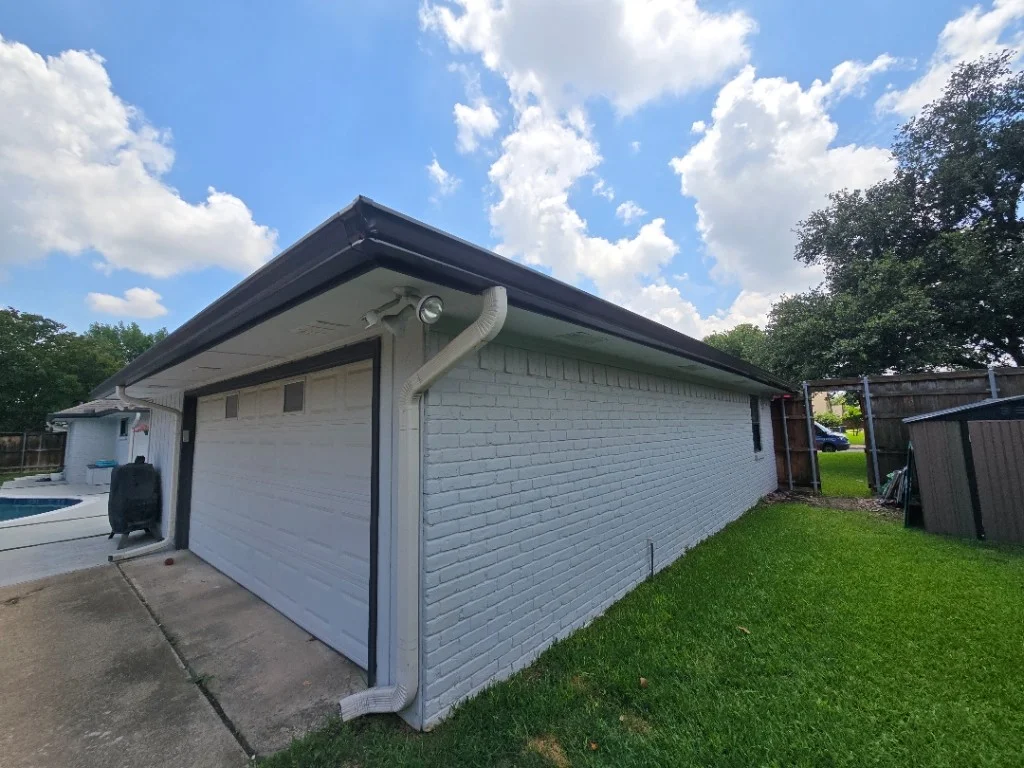 New gutters and downspouts after replacement on a Dallas–Fort Worth home