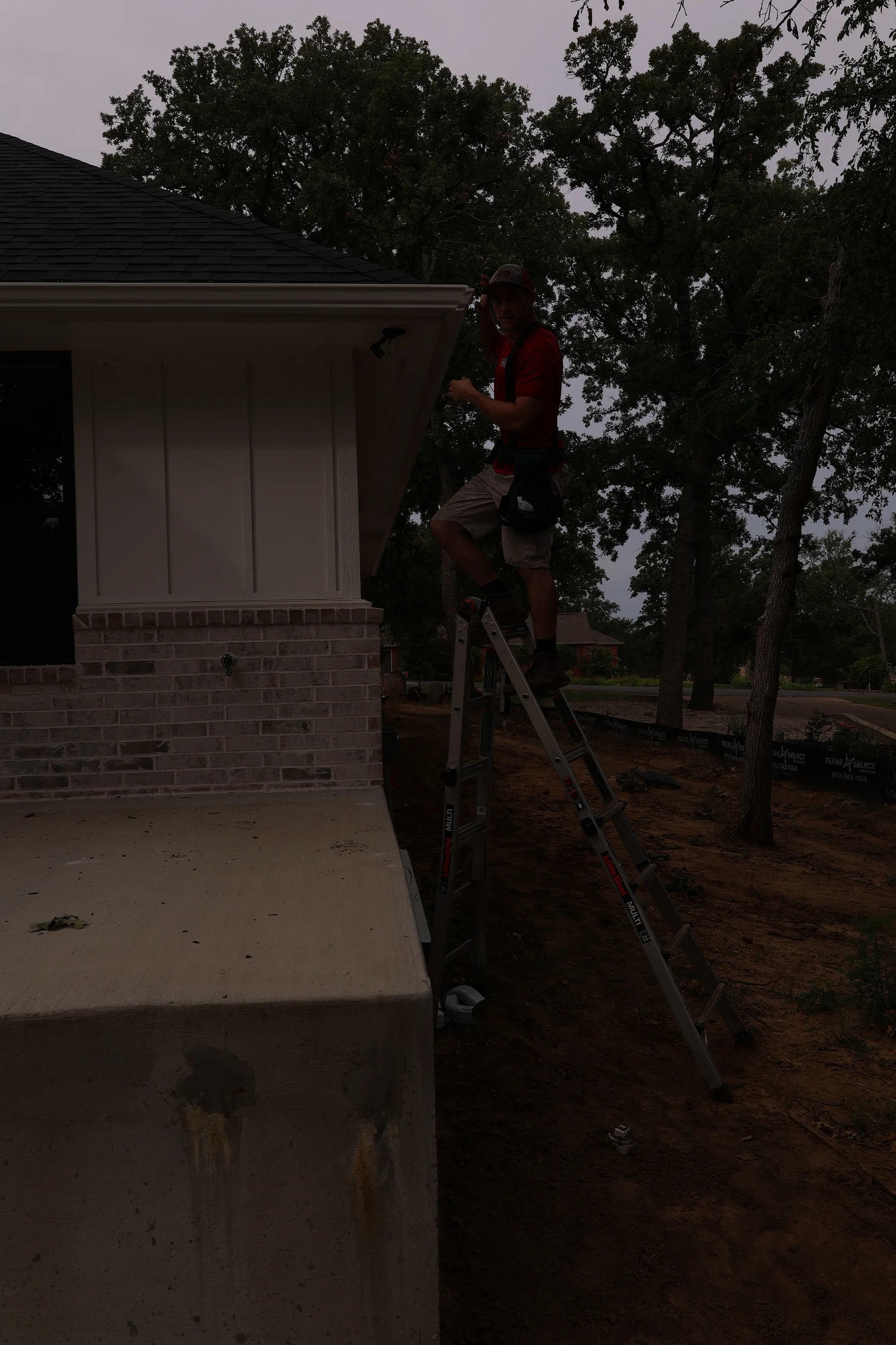 North Texas Gutters crew working on a Carrollton gutter project