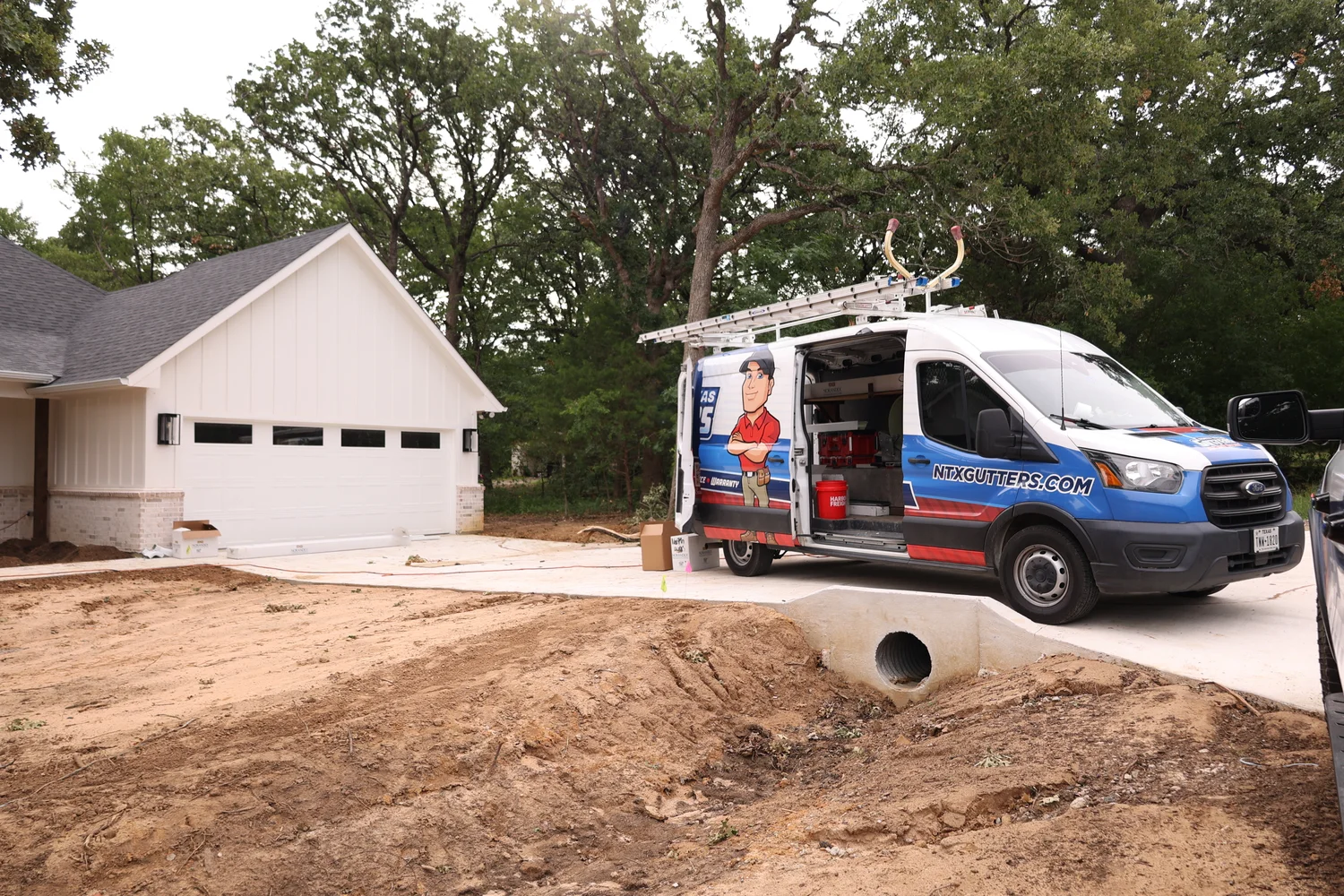 North Texas Gutters crew working on a Dallas gutter project