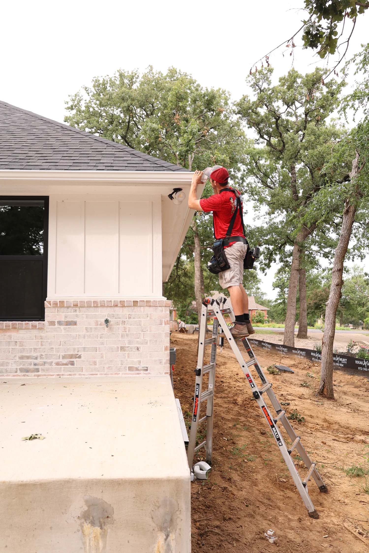 North Texas Gutters crew working on a Denton gutter project