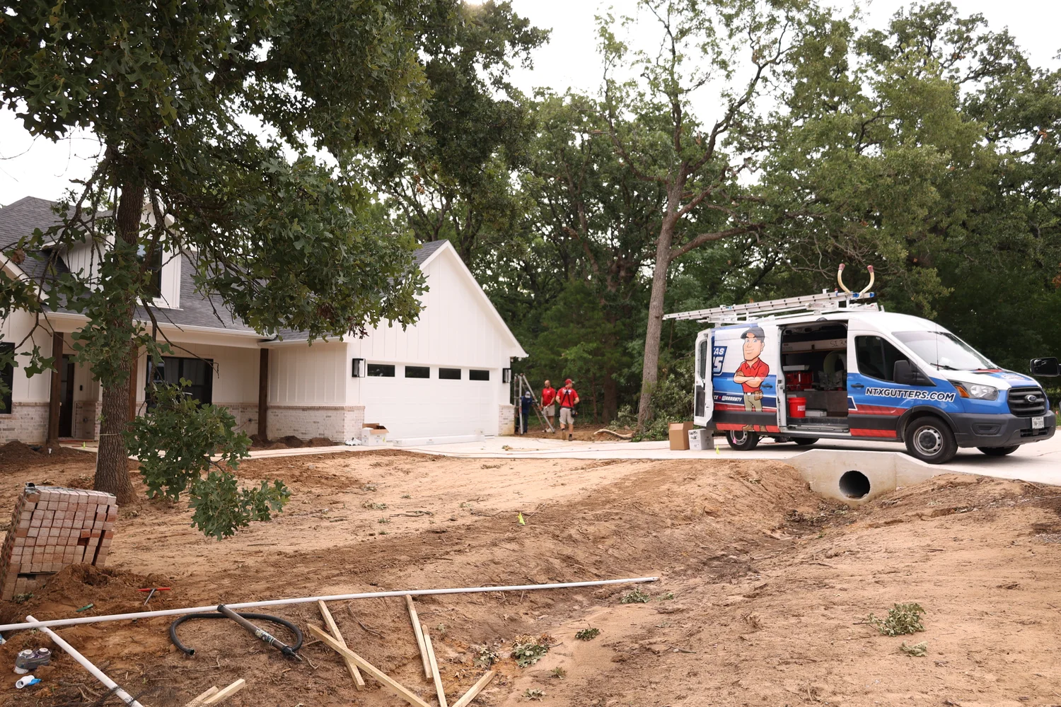 North Texas Gutters crew working on a Fort Worth gutter project