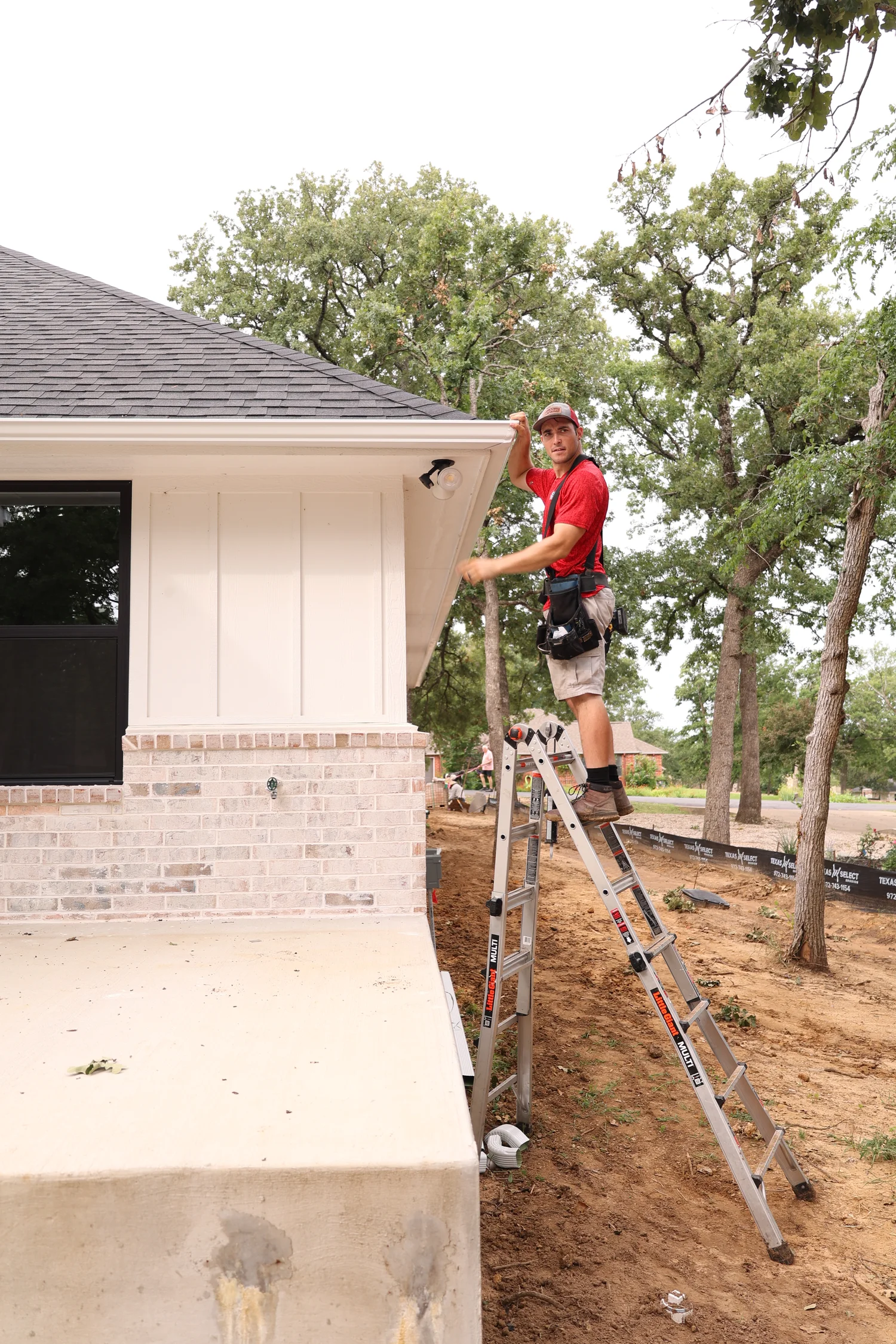 North Texas Gutters crew working on a Keller gutter project