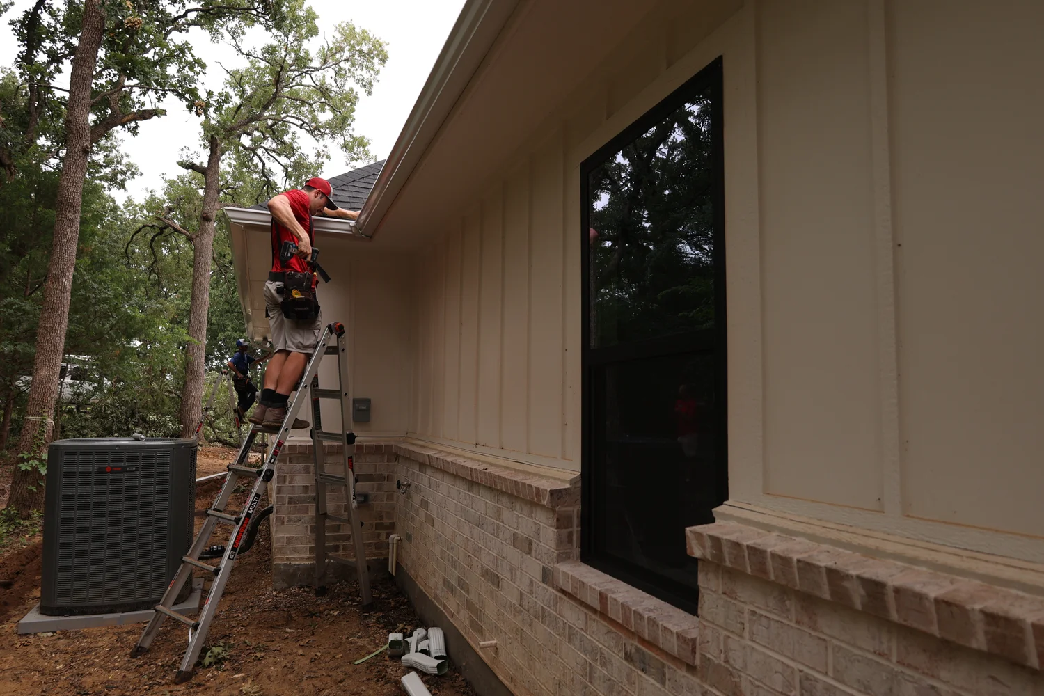 North Texas Gutters crew working on a Richardson gutter project