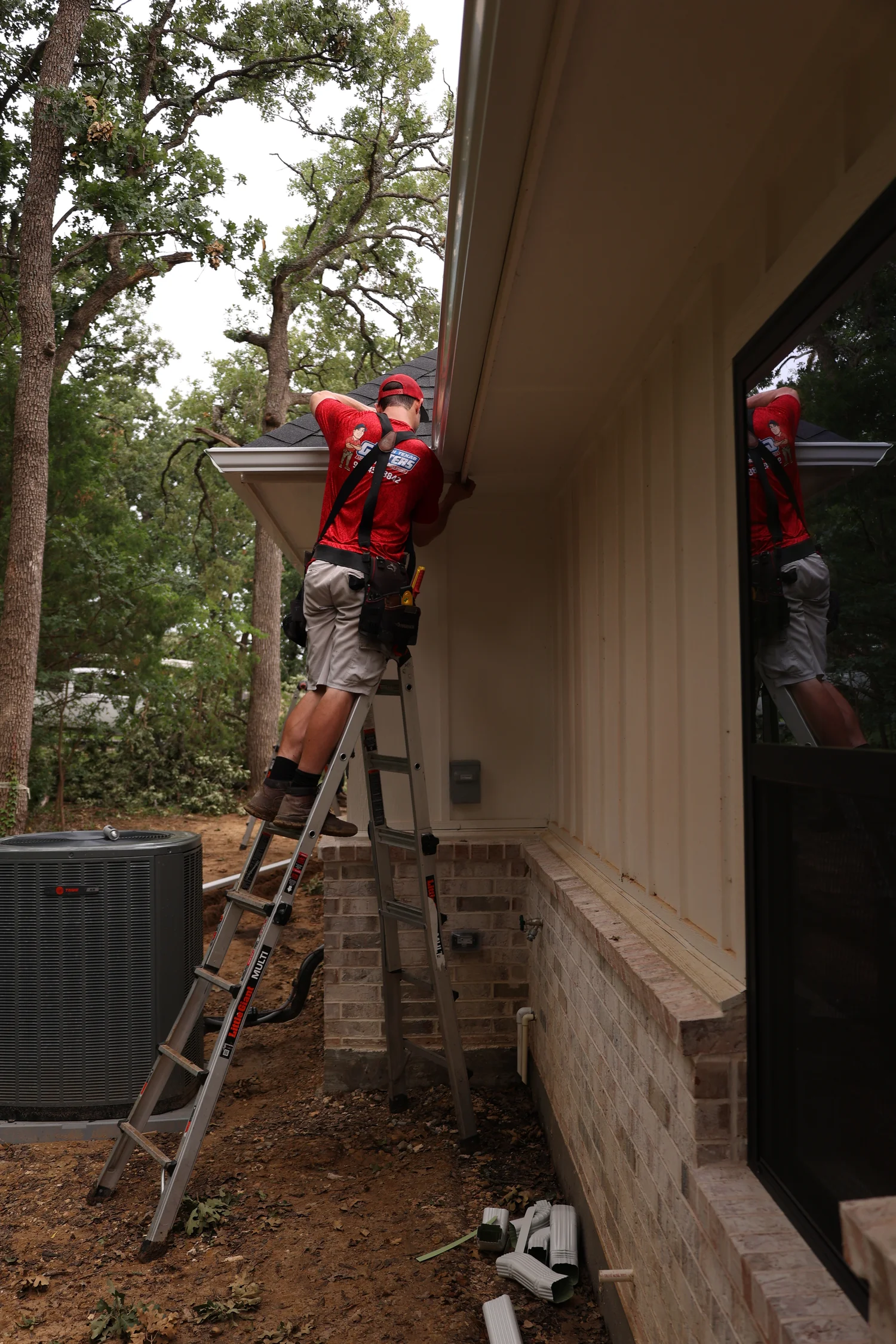 North Texas Gutters crew working on a Rockwall gutter project