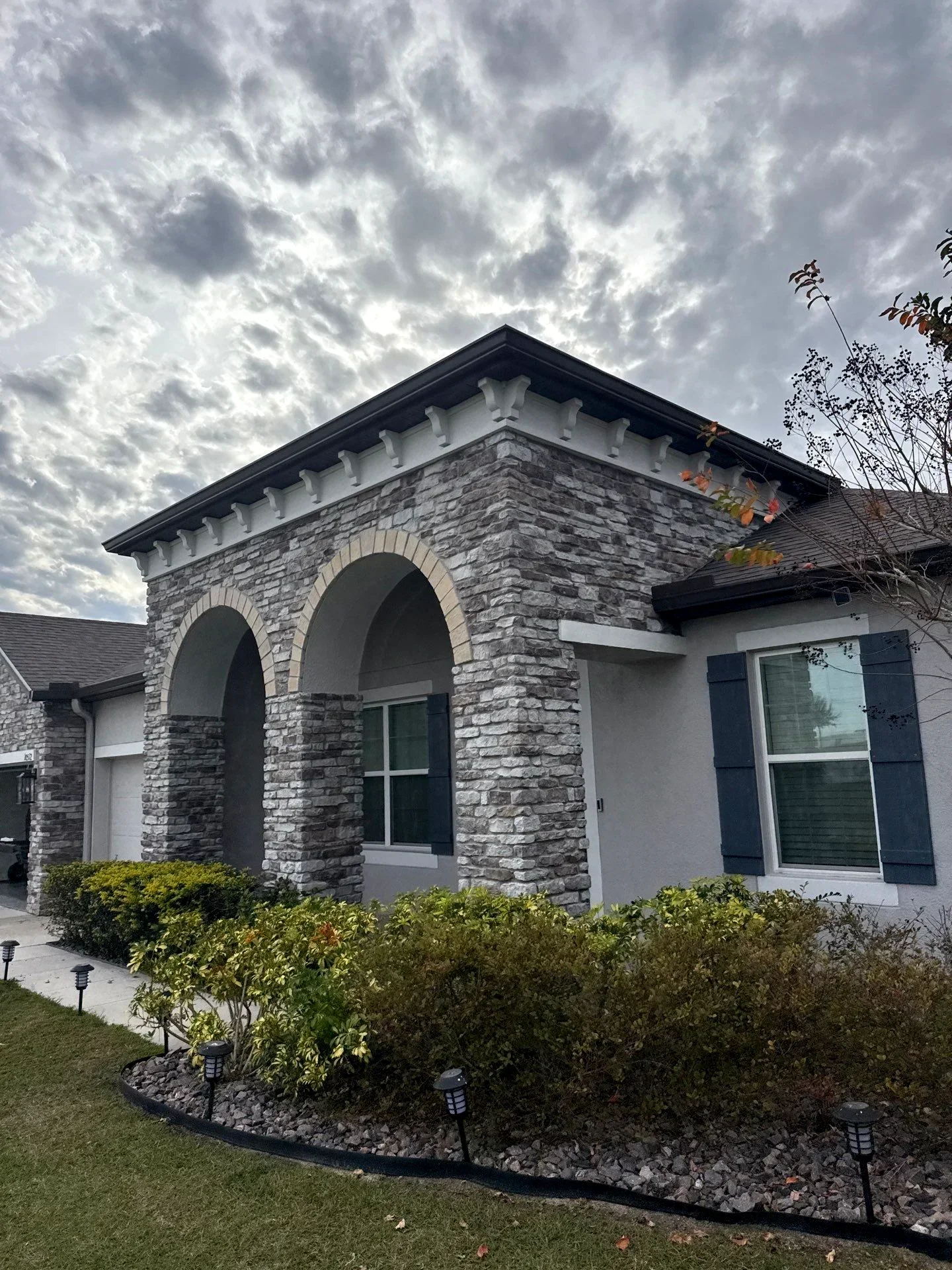 Seamless gutter installation on a Fort Worth residential home