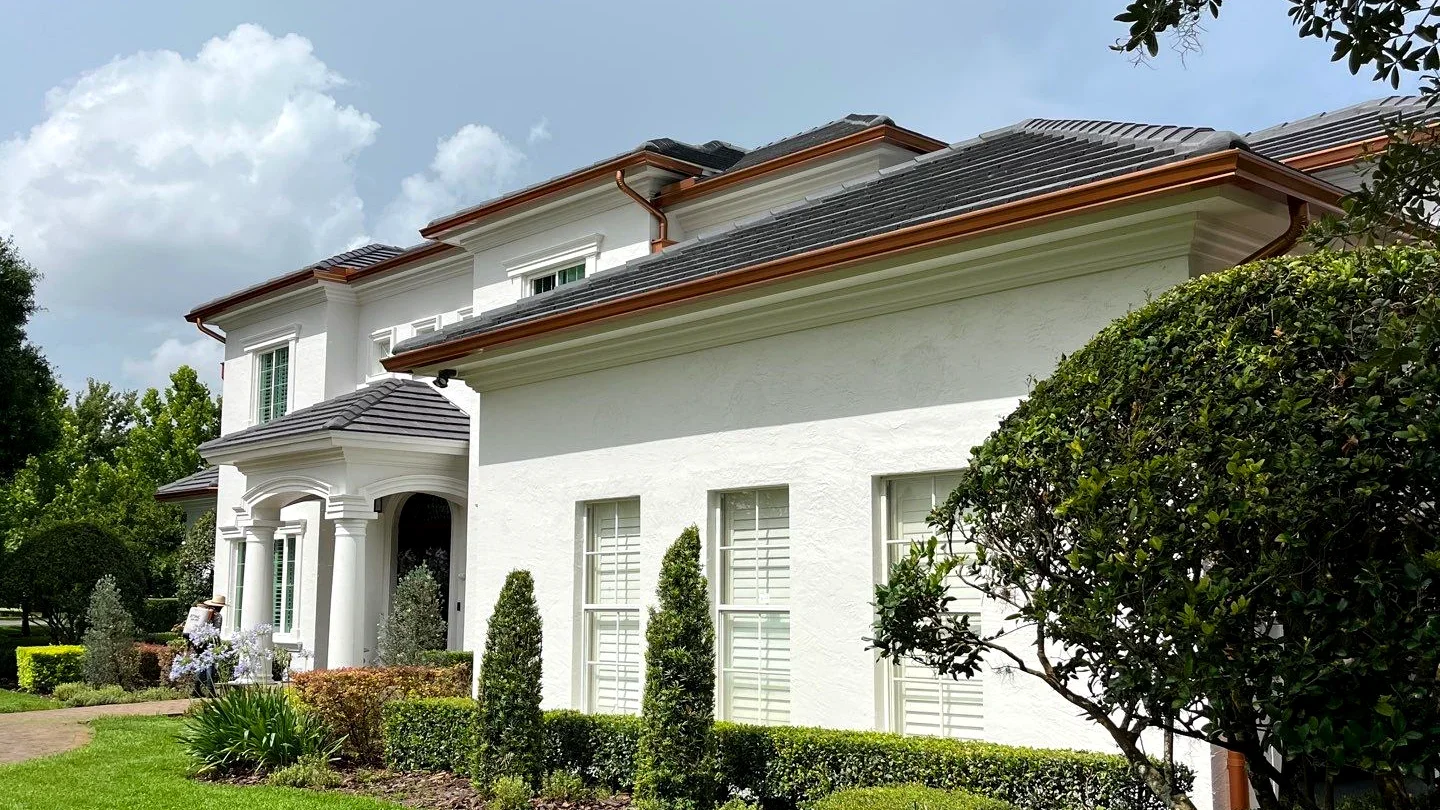 Seamless gutter system on a townhome in The Colony